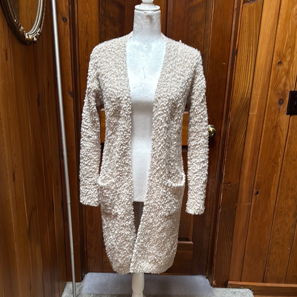 Long sleeved cardigan sweater